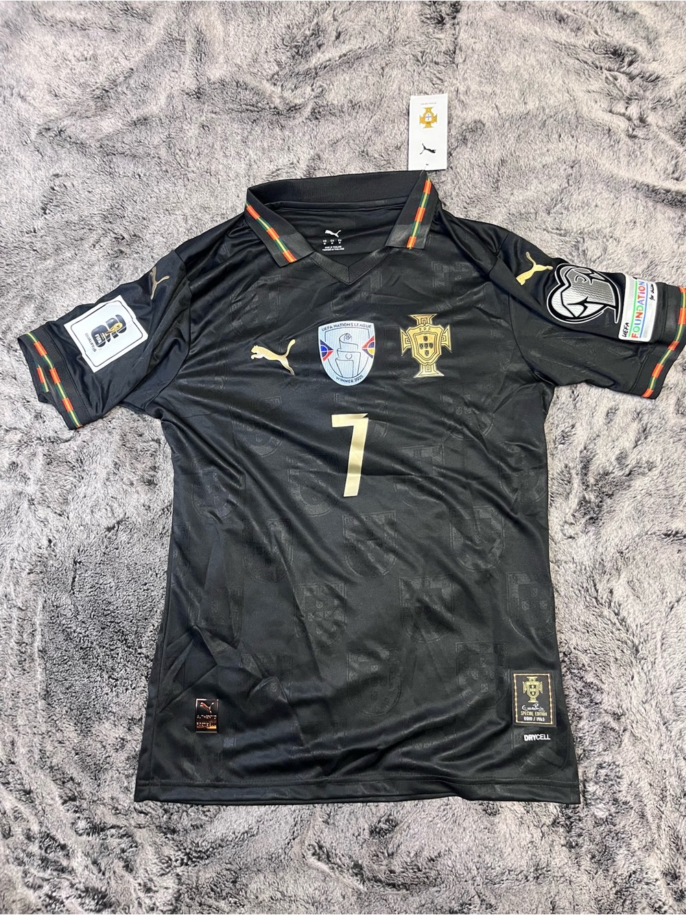 Puma Black Portugal Mens Soccer Jersey with Gold Accents
